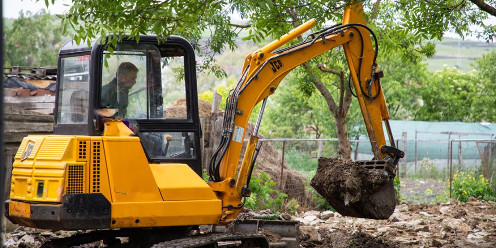 Excavator operating on a construction project highlighting factors that influence excavator hire costs in Sydney